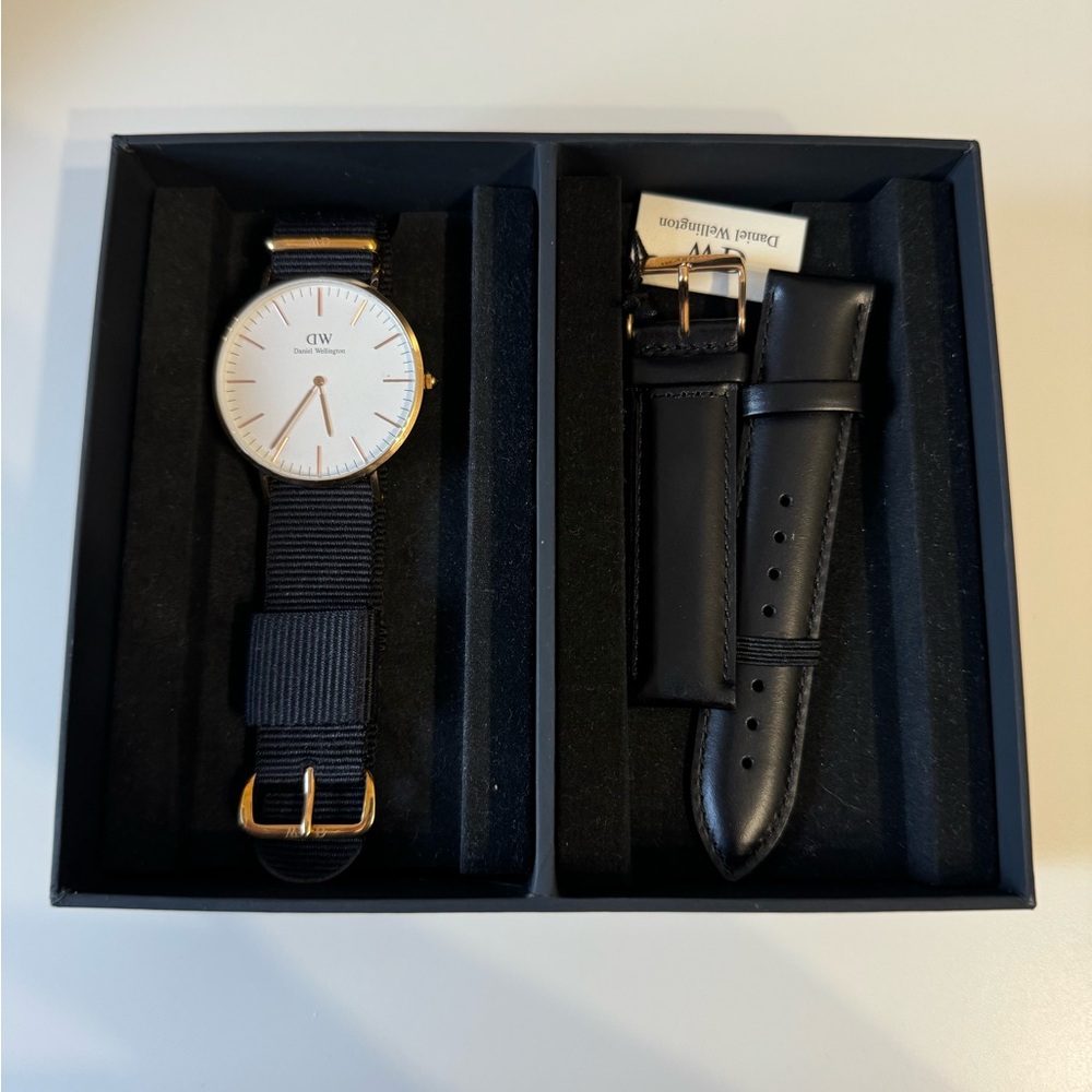 Daniel Wellington Black and Gold Women's Watch with White Dial